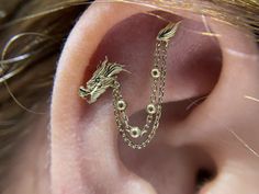 1976 from Junipurr – Three Moons Body Shop Ear Scape, Unique Piercing, Chinese Dragons, Dragon Earrings, Piercings Unique, Body Modification, Gold Dragon, Traditional Earrings, Dragon Jewelry