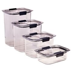 three clear storage containers with black lids