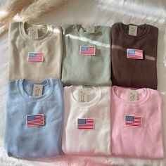 These cute US flag sweatshirts and shirts are perfect for lounging and 4th of July! - The US flag patch iron-on patched and is heat pressed, not embroidered. - All our sweatshirts and shirts run a Unisex fit. They are naturally oversized, but if you like a more baggy look, we recommend sizing up. - Material is super soft and comfy! ♡ - Please note that crewneck & tshirt brand used may vary depending on what our supplier has, therefore sizes and dimensions might also vary by a little bit. (Hanes, Crewneck Aesthetic, Vintage 4th Of July, Usa Sweater, July Outfits, Vintage Crewneck Sweatshirt, Usa Sweatshirt, Crew Neck Tshirt, 4th Of July Shirt, 4th Of July Outfits