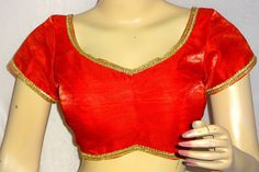 This is Red color Handmade Saree Blouse. Item is made in Dupion Fabric Size available from 32 to 50.  All blouses have two inches margin which can be open for further adjustments   We can do any type of alteration like short sleeves or long sleeves etc Shipping - The Order will be dispatched within 2-3 working days time. Standard (Free Shipping) Orders - Will be dispatched by Postal Service. It takes about 13 to 18 working days time for most locations worldwide. The Shipping is Free By Courier S Red V-neck Blouse For Wedding, Elegant Red V-neck Blouse Piece, Red Self-design Party Blouse, Red Party Blouse, Elegant Red Blouse For Festivals, Elegant Red Blouse With Self Design, Fitted Red Top With Self Design, Red V-neck Bollywood Blouse Piece, Bollywood Style Red V-neck Blouse Piece