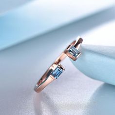 This is a open gap baguette cut natural London blue topaz wedding ring,matching band,stacking ring.A perfect anniversary gift, birthday gift,wedding engagement ring.Great as a gift or a anniversary ring.Ring Information<><><><><><><><><><><><><><><>Stone*3x2mm baguette cut natural London blue topaz .Metal* Solid 10k 14k &18k.*Color:white gold,yellow gold,rose gold.Custom Order<><><>&lt Blue Topaz Baguette Cut Wedding Ring, Wedding Jewelry With Baguette Cut Blue Topaz, Blue Topaz Baguette Cut Jewelry For Wedding, Wedding Topaz Ring With Baguette Cut, Baguette Cut Topaz Ring For Wedding, Blue Topaz Baguette Cut Ring For Wedding, Emerald-cut Rose Gold Topaz Ring For Wedding, Emerald Cut Rose Gold Topaz Ring For Wedding, Rose Gold Emerald Cut Topaz Ring For Wedding