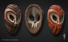 three masks with different designs on them, one has a skull and the other is a demon