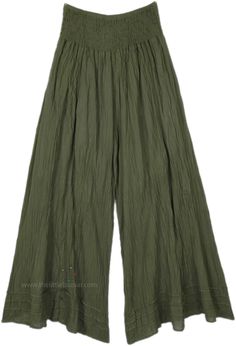 A pair of palazzo pants in dark green for summer or spring or fall made of comfortable organic cotton fabric.  The bottom of the pants is very wide, which gives it a flow as you walk. #tlb #SplitSkirtsPants #Misses #vacationclothing #beachwrap #Solid #WideLegCottonPants Olive Wide Leg Pants For Spring, Olive Wide Leg Summer Bottoms, Olive Wide Leg Bottoms For Summer, Green Wide Leg Harem Pants For Spring, Green Cotton Wide Leg Pants With Elastic Waistband, Green Wide-leg Harem Pants For Spring, Green Cotton Ankle-length Bottoms, Green Cotton Ankle-length Pants, Green Ankle-length Cotton Bottoms