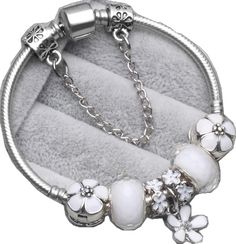 DAISY CHARM SILVER BRACELET - B ANN'S BOUTIQUE Dainty White Round Charm Bracelet, Silver Dainty Charms, Everyday White Dangling Charms, Dainty Silver Charms, Elegant White Charms, Elegant White Silver Chain Bracelet, Everyday White Gold Charm Bracelet, White Metal Charm Bracelet, Dainty White Bangle Charm Bracelet