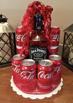 a cake made to look like coca - cola cans