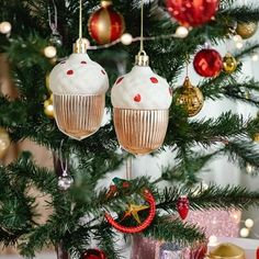 a christmas tree with ornaments hanging from it