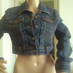 This Is A Hot Cropped Jean Jacket. Love The Studs, Great Lines And Threading. Pockets In Front And Studded Up. Always Love The Cropped Jean Jackets, They Are Sexy. Ptp 17 No No No Stretch Fitted Dark Wash Cropped Jacket For Fall, Fitted Medium Wash Cropped Jacket With Pockets, Fitted Cropped Jacket With Pockets In Medium Wash, Fitted Cropped Denim Jacket For Winter, Fitted Dark Wash Cropped Jacket With Long Sleeves, Fitted Long Sleeve Dark Wash Cropped Jacket, Trendy Fitted Denim Jacket For Fall, Fitted Denim Cropped Jacket With Buttons, Fitted Medium Wash Cropped Long Sleeve Jacket