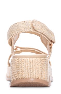 Woven raffia straps intensify the earthy vibes of a platform sandal fashioned with hook-and-loop straps for easy adjustability. 2" heel; 1" platform Adjustable hook-and-loop straps Synthetic upper, lining and sole Imported Adjustable Strap Block Heel Sandals, Adjustable Sandals With Block Heel For Vacation, Adjustable Block Heel Sandals For Vacation, Beige Adjustable Ankle Strap Wedge Sandals, Strappy Heels With Adjustable Strap, Adjustable Strap Strappy Heels, Adjustable Strappy Heels With Adjustable Strap, Natural Sandals With Heel And Ankle Strap, Vacation Wedge Sandals With Adjustable Ankle Strap