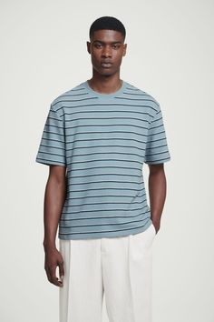 A striped tee is a must in any modern wardrobe. This one is crafted from pure cotton with a tactile bouclé texture and cut for a relaxed fit so it's breezy and comfortable for all-day wear. Wear it with jeans, shorts or pants – just about anything goes. Relaxed fit, 215gsmCrew neckShort sleeves 100% Cotton / Machine wash Back length of size M is 27.99" / Model wears a size M Everyday Horizontal Stripe Short Sleeve T-shirt, Summer Cotton Tops With Horizontal Stripes, Cotton Tops With Horizontal Stripes For Summer, Casual Cotton Top With Horizontal Stripes, Relaxed Fit Crew Neck T-shirt With Horizontal Stripes, Cotton T-shirt With Horizontal Stripes For Summer, Summer Cotton T-shirt With Horizontal Stripes, Casual Horizontal Stripe Pattern T-shirt For Everyday, Casual Striped T-shirt For Everyday