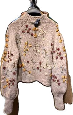 Casual Multicolor Embroidered Sweater, Embellished Long Sleeve Cardigan For Fall, Winter Embroidered Knit Tops, Casual Winter Sweater With Floral Embroidery, Winter Embellished Long Sleeve Cardigan, Beige Embroidered Long Sleeve Sweater, Embroidered Beige Sweater For Fall, Embroidered Long Sleeve Beige Sweater, Long Sleeve Embellished Cardigan For Winter