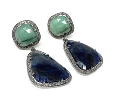 Genuine Emerald and Blue Sapphire Pave Diamond Earrings. Size : 2” x 1” Weight : 24.27g Stone Weight : 11.26 g Diamond Weight : 1.54 Cts Gemstone. : Genuine Blue Sapphire, Genuine Emerald and Genuine Diamonds ( Conflict free Diamonds) Treatment. : No treatment Metal. : Black Rhuthenium over Silver and 14K Gold Plated over Silver . These beautiful Emerald and Sapphire Earrings are handmade with meticulous care using genuine diamonds and Natural Gemstones bezel set in Black Rhuthenium over Sterling Silver in front and back with 14K Gold Plated Push back Closure. These makes a perfect gift for any Occasion with its beautiful symbolic meaning. Ready to Ship Ships from USA Blue Sapphire Earrings, Pave Diamond Earrings, Emerald Earrings, Sapphire Earrings, Natural Sapphire, Conflict Free Diamonds, Pave Diamonds, Blue Sapphire, Natural Gemstones