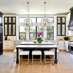 the kitchen is clean and ready to be used for cooking or eating, with an island in the middle