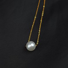 Product Details Hypoallergenic jewelry for sensitive skin Stainless Steel Gold Tone PVD Chain Necklace Minimalist Pearl Pendant Necklace The pearl pendant showcases a refined and understated beauty that pairs seamlessly with both casual and formal ensembles. The necklace's minimalist design allows you to wear it as a standalone piece or layer it with other necklaces for a personalized look. This stainless steel chain necklace is built to withstand the test of time. The durable construction ensur Elegant Hypoallergenic Round Pendant Necklace, Minimalist Pearl White Pearl Necklace With Clavicle Chain, Elegant Hypoallergenic Pendant Necklaces, Elegant Hypoallergenic Pendant Necklace, Classic Hypoallergenic Round Pendant Necklace, Minimalist Pearl Charm Chain Necklace, Simple Formal Necklace With Clavicle Chain, Minimalist Round Pendant Pearl Necklace, Minimalist White Pendant Chain Necklace