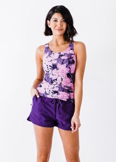 Maya Swim Top Fit & Sizing Tight Fit Top Length 66.5cm (Size S) If you are between sizes, or in doubt, please size up. Features Tankini Round Neckline Built-in Bra for shaping and support Side ruching creates a flattering cinched look UPF 50+ Sun Protection Swimwear Racerback for chic, modern detail Quick Dry Care Rinse in cold water to wash off any chemicals, chlorinated water or saltwater Machine wash in cold water on gentle cycle Lay flat to dry in the shade Material Sporty Tankini With Built-in Shorts, Pink Short Length Top For Sports, Fitted Pink Top With Elastic Waistband, Fitted Tankini For Spring Workout, Spring Workout Fitted Tankini, Fitted Spring Workout Tankini, Fitted Racerback Activewear With Built-in Shorts, Pink Stretch Tankini Casual Style, Sporty Stretch Tankini With Built-in Shorts