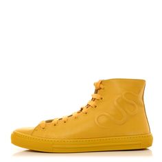 This is an authentic pair of GUCCI X ADIDAS Calfskin Womens High Top Sneakers in yellow. These stylish sneakers made in collaboration with Gucci and Adidas are crafted of textured yellow leather. Gucci X Adidas, Yellow Leather, Handbag Wallet, Wallet Accessories, Gucci Shoes, Stylish Sneakers, High Top, Top Sneakers, Calf Skin