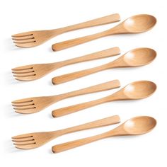 wooden spoons and forks lined up in a row