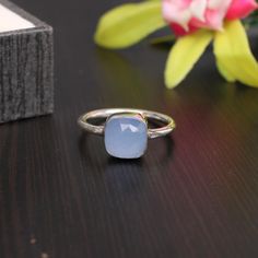 Dainty Blue Chalcedony Silver Ring - Stacking Rings - Sterling Silver Ring - Gemstone Rings - Blue Rings -Chalcedony Jewelry - Gift for Her 》D E T A I L S《 ✦Gemstone : Blue Chalcedony ✦Metal : 925 Sterling Silver ✦Gemstone Size : 8 x 8 MM Approx ✦Weight : 3 Gram Approx ❣❣ Handmade Item ❣❣ **This ring is Made to Order** 》G EM S T O N E D E T A I L《 **Gemstone structure may vary from the image as two gemstones do not have the same structure** If you want to see the picture of gemstone, then feel f Blue Stackable Jewelry As Gift, Adjustable Chalcedony Jewelry For Anniversary, Adjustable Blue Moonstone Ring Gift, Adjustable Blue Moonstone Promise Ring, Blue Ethical Moonstone Ring For Gift, Handmade Blue Birthstone Ring As Gift, Handmade Blue Birthstone Ring For Gift, Blue Moonstone Stackable Ring, Blue Round Stackable Moonstone Ring