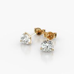 14K Yellow Gold Three Prong Martini Round Lab Created Diamond Stud Earrings (0.75 CTW - F-G / VS2-SI1). These three-prong martini settings have five pieces of metal; three prongs, under bezel and post that are all constructed to the exact size of the lab created diamonds being used to ensure they sit perfectly flush into the setting. The lab created diamond is set exactly as the Martini design was intended - as an earring that floats on the ear - perfectly. Screw backs are available for an addit Classic Heart Cut Brilliant Diamond Earrings, Gia Certified Yellow Gold Diamond Earrings As Gift, Classic Heart Cut Diamond Earrings With Vvs Clarity, Classic Heart Cut Diamond Earrings, Classic Heart Cut Diamond Earrings For Formal Occasions, Classic Heart Cut Diamond White Earrings, Classic Heart Cut Earrings For Formal Occasions, Classic Diamond White Heart Cut Earrings, Classic Gold Heart Cut Diamond Earrings