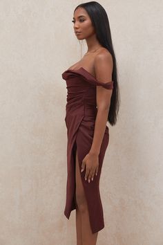 'Rhoda' is cut from our ultra luxe duchess satin and has an off shoulder fit for that sexy languid vibe. It's fully bones through the corset with a balconette cut that's super flattering for the bust. The side draping snatches the waist right in a... Fitted Off-shoulder Corset Dress With Ruched Bodice, Fitted Ruched Off Shoulder Dress With Sweetheart Neckline, Fitted One-shoulder Satin Prom Dress, Elegant Off-shoulder Ruched Corset Dress, Fitted Ruched Satin Dress With One Shoulder, Party Dress With Lined Bodice And Off-shoulder Design, Party Off-shoulder Dress With Lined Bodice, Off-shoulder Party Dress With Lined Bodice, Glamorous Fitted Bodice Off-shoulder Dress