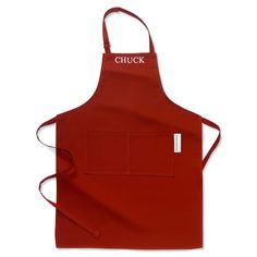 a red apron with the word chuck on it