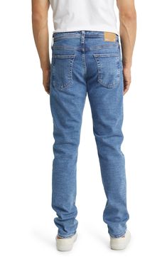 Made with a peck of stretch for comfort, these slim-fit jeans are the answer to casual days at the office and weekend-ready ensembles. 33 1/2" inseam; 14" leg opening; 10" front rise; 15" back rise (size 29) 98% cotton, 2% polyurethane Machine wash, tumble dry Imported Stretch Denim Jeans For Business Casual, Slim Fit Tapered Leg Jeans For Business Casual, Slim Fit Jeans With Tapered Leg For Business Casual, Fitted Straight Leg Jeans For Business Casual, Fitted Jeans For Business Casual, Slim Fit Mid-rise Jeans For Business Casual, Business Casual Slim Fit Mid-rise Jeans, Straight Five Pocket Jeans For Business Casual, Mid-rise Slim Fit Jeans For Business Casual