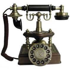 an old fashioned phone with two dials on it