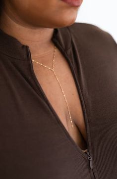 Perfect for layering, stunning oval links shine along this Y-necklace for a delicately beautiful day-to-night accessory. 20" length; 5" drop Lobster clasp closure 14k-gold fill or sterling silver Made in the USA Minimalist Gold Lariat Body Chain, Minimalist Delicate Lariat Body Chain, Elegant Figaro Chain Lariat Necklace, Elegant Figaro Lariat Chain Necklace, Elegant 14k Gold-filled Oval Link Necklaces, Elegant Gold Y-shape Chain Necklace, Elegant 14k Gold Filled Oval Link Necklace, Elegant Lariat Chain Necklace With Paperclip Chain, Elegant Lariat Necklace With Paperclip Chain