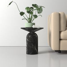 a living room with a couch, chair and potted plant on the side table