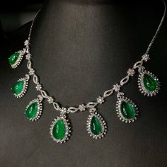 "\"The Teardrop Emerald Necklace\" - Worldclass masterpiece! THIS SET IS A MUST HAVE FOR ANY JEWELRY COLLECTOR! HUGE AND SPARKLING! Vivid green emeralds with full gemological certificates! Surrounded by almost 14 carats of DIAMONDS! Glamorous! Set in one of a kind, elegant 18K solid white gold, handmade settings! Suggested Retail price: $65,000 USD NECKLACE & PENDANT: Central emerald: 8.80 carats! Vivid green, with great translucency. Accented Cabochon Teardrop Emeralds: 6 pieces: 35.21 cara Earrings Chain, Diamond Necklace Set, Vs Diamond, Emerald Necklace, White Gold Earrings, Jewellery Design, Chain Pendant, High Jewelry, Chain Pendants