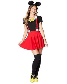 a woman dressed in mickey mouse costume