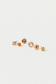 Set of 40 small delicate studs including 13 sets with shimmering stones and 7 sets with fun metal shapes. Easily mix and match to create your unique look. | Teeny Tiny Mega Stud Earring Set by Free People in Gold Colorful Stud Earrings, Natural Essence, Stud Earrings Unique, Here And Now, Birthday Wishlist, Neutral Fashion, Stud Earrings Set, Ear Studs, Stud Earring