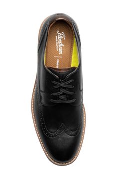 Brogue perforations and wingtip styling add timeless sophistication to a leather derby set on a cushioned footbed and flexibe rubber sole. Lace-up style Cushioned footbed Leather upper/textile lining/rubber sole Imported Leather Wingtip Lace-up Shoes With Cushioned Footbed, Business Wingtip Lace-up Shoes With Cushioned Footbed, Classic Wingtip Lace-up Shoes With Cushioned Footbed, Classic Wingtip Lace-up Shoes With Removable Insole, Wingtip Dress Shoes With Cushioned Footbed, Wingtip Lace-up Shoes With Cushioned Footbed For Work, Wingtip Oxford Lace-up Shoes With Cushioned Footbed, Wingtip Oxfords With Leather Footbed For Derby, Business Wingtip Oxfords With Cushioned Footbed