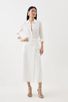 Clean Tailored Maxi Skirt | Karen Millen Elegant Cotton Maxi Skirt, Fitted Wrap Skirt For Workwear, Elegant White Maxi Skirt For Work, Elegant Cotton Maxi Skirt For Daywear, Cotton Workwear Maxi Skirt With Gathered Detail, Elegant Cotton Pencil Skirt Bottoms, Elegant Cotton Pencil Skirt, Elegant Cotton Maxi Skirt For Spring, Elegant Cotton Asymmetrical Maxi Skirt