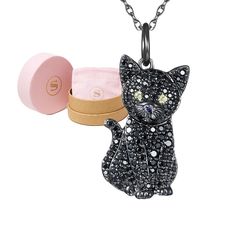 PRICES MAY VARY. Crafted with premium plated Gunmetal and sterling silver with sparkling black spinel and Cubic Zirconia to create a timeless cat charm, the perfect choice for a cat jewelry gift The adorable black kitty cat necklace charm features delightful details, including sparkling yellow cubic zirconia eyes and engraved whiskers, a dainty 0.9 in (h) x 0.6 in (w) Packaged in a lovely gift box, this cat necklace is a thoughtful gift for any occasion; it’s an ideal present for any special mom Human Heart Necklace, Black Cat Jewelry, Anatomical Heart Necklace, Pokemon Jewelry, Elegant Cat, Black Pendant Necklace, Black Cat Necklace, Cat Pendant Necklace, Black Kitty