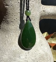 Canadian Nephrite Jade Teardrop PendantMeasures approximately 17 x 32 x 9mm on an adjustable wax cord. The cord adjusts up to 26."Comes with or without our handcrafted wooden gift box Jade West, Wood Gift Box, Jade Charm, Wooden Gift Boxes, Jade Bangle, Nephrite Jade, Jade Earrings, Jade Ring, Jade Bracelet