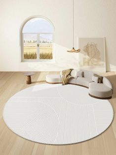 a living room with a round rug on the floor