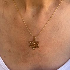 "A beautiful Star of David necklace comes in a unisex design. The chain is goldfield and the Star of David is Gold plated with high-quality 2-micron gold. Great as a gift for a Bar mitzvah or Bat mitzvah, birthday, or holiday. This piece of jewelry comes wrapped in a nice package and is ready to be given as a gift. ❤ 𝗠𝗘𝗔𝗦𝗨𝗥𝗘𝗠𝗘𝗡𝗧𝗦 ❤ Pendant width:0.91\"/2.31 cm. Pendant length: 0.91'/2.31 cm. Please choose your length from the drop-down list. ❤ 𝗠𝗬 𝗦𝗧𝗢𝗥𝗘 ❤ For more pendant neckl Elegant Gold Star Of David Charm Necklace, Gold Plated Star Charm Necklaces, Gold Star Of David Charm Necklace As Gift, Gold Star Of David Charm Necklace For Gift, Gold Star Of David Spiritual Necklace, Yellow Gold Star Of David Charm Necklace Gift, Yellow Gold Star Of David Charm Necklace, Gold Plated Star Of David Necklace As Gift, Gold Star Of David Necklace In 14k Gold