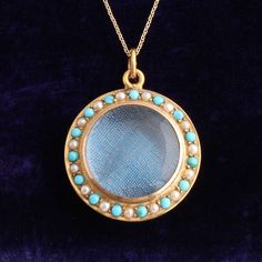 A beautifully made Victorian locket fashioned in warm 15k gold and set with alternating turquoise cabochons and seed pearls. The lenses are made of solid rock crystal which gives this piece a pleasing weightiness. Lovely quality. Turquoise Locket For Wedding Jewelry, Turquoise Locket Jewelry For Wedding, Turquoise Wedding Locket Jewelry, Turquoise Round Pendant Locket Jewelry, Turquoise Round Locket Jewelry, Turquoise Medallion Locket Jewelry, Round Turquoise Locket Jewelry, Victorian Turquoise Jewelry For Wedding, Victorian Turquoise Necklace For Wedding