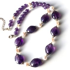 "THIS LISTING IS FOR THE NECKLACE ONLY Earrings shown for illustration and listed separately MATERIALS & DIMENSIONS ✦ Natural AMETHYST, deep purple, faceted ovals approx. 16x14mm, round beads 6mm; ✦ Freshwater PEARLS, white, round approx. 7|5mm; ✦ STERLING SILVER bead caps, crimps, jump rings and lobster claw clasp with 2\" inches extender chain; ✦ Total circumference length is about 16\" inches (41cm), plus 2\" inches extension; ✦ You will receive shown necklace; PACKAGING & SHIPPING ✦ Your necklace will arrive nicely packaged in a jewelry box with a ribbon, perfect for gift giving or treating yourself; ✦ \"Gift Wrap\" option is available during checkout - we will attach \"A Gift for You\" card with an optional note from you; ✦ Receipts and prices are not included with orders marked as \" Elegant Necklaces With Round Amethyst Beads, Elegant Amethyst Round Bead Necklaces, Elegant Amethyst Necklaces With Round Beads, Elegant Faceted Purple Crystal Necklace, Elegant Adjustable Amethyst Necklace, Elegant Purple Faceted Crystal Necklace, Purple Amethyst Jeweled Necklaces, Handmade Amethyst Jewelry, Elegant Handmade Purple Crystal Necklaces