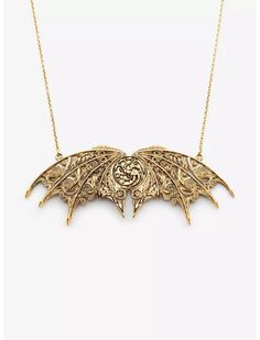 When you build your house on Fire and Blood, you have no concerns about subtlety, and this epic double-hung necklace is anything but subtle! With complex detailed artwork recessed into brass wings adorning the already fearsome Targaryen sigil, this beastly jewelry piece measures 10cm (3.94") across and is hung on an 18" matching brass chain with a 2" extender and lobster clasp. House Of The Dragon Targaryen, Dragon Shirts, Targaryen Sigil, House On Fire, Build Your House, Fire And Blood, Dark Jewelry, Retro Skirt, Her Universe