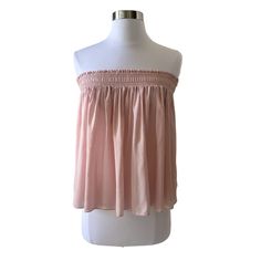 Color: Light Pink Style: Smocked Ruffle Top Semi Sheer Measurements: Bust 16.5” Un-Stretched, Armpit To Armpit Length 17” Fabric: 100% Lyocell Machine Wash Condition: New Spring Off-shoulder Tube Top With Smocked Bodice, Spring Off-shoulder Smocked Bodice Tube Top, Off-shoulder Smocked Bodice Tube Top For Spring, Sleeveless Tube Top With Smocked Back For Spring, Flowy Smock Blouse, Ruched Tube Top For Spring Summer, Spring Stretch Tube Top With Smocked Bodice, Summer Strapless Smocked Stretch Top, Summer Flowy Ruched Blouse