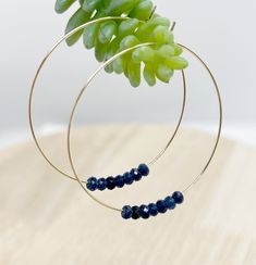 Natural navy blue gemstone hoop earrings, beaded hoop earrings, dainty bead hoop earrings, dangle gold earrings, hoop beaded earrings, big hoop earrings, hoop earrings, 16k gold plated hoop These hoop earrings are so chic to show off your style by wearing them with your hair tucked or low in bun. They are perfect for daily wear in the office or a night on the town.  Earrings are enlarge to show details and colors might vary depend on each computer monitor or cell phone screen.  Each piece will b 14k Gold Filled Beaded Hoop Earrings, Blue Small Hoop Wire Wrapped Earrings, Blue Wire Wrapped Small Hoop Earrings, Small Blue Wire Wrapped Hoop Earrings, Blue 14k Gold Filled Hoop Jewelry, Blue Wire Wrapped Hoop Earrings For Everyday, Everyday Blue Wire Wrapped Hoop Earrings, Handmade Blue Hoop Earrings In 14k Gold Filled, Handmade Blue 14k Gold Filled Hoop Earrings