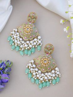 Statement earrings for a statement look! These handmade high quality kundan polki and meenakari earrings available in olive green and sky blue colours are a unique addition to your outfit to glam it up! These can be paired with both Indian and western outfits. They are also extremely lightweight because they are handcrafted. Easy on your ears and beautiful for the eyes 💖 For any queries, please reach out to us. Happy shopping! Luxury Multicolor Bridal Earrings For Diwali, Sky Blue Earrings Indian, Green Kundan Bridal Earrings With Stone Work, Green Kundan Chandbali Necklace With Gota Work, Green Kundan Chandbali Necklace With Meenakari, Green Chandbali Kundan Necklace With Meenakari, Green Meenakari Chandbali Kundan Necklace, Festive Green Chandelier Earrings With Stone Work, Festive Green Bridal Earrings With Stone Work