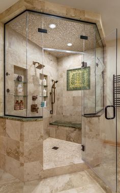 a walk in shower sitting inside of a bathroom