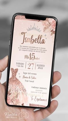 a person holding up a cell phone with a wedding card on it