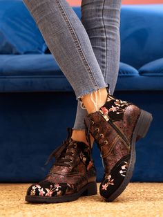 Take your stomping game to a whole new level with these wild Soffia Jordie Floral Embossed Leather Combat Boots! Perfect for wearing to a punk rock show or just for kicking around town, they'll be sure to make a colorful statement. Get your floral (and rebellious) on! 1.18" heel 3.2" shaft 10.5'' circumference Zip & Lace-up closure Leather upper Leather lining Leather midsole Leather insole Rubber sole