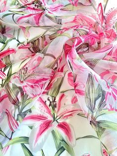 pink flowers and green leaves on a white background