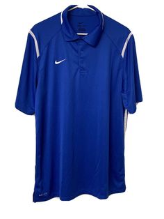 Nike Dri-fit Men's polo shirt. Blue with white on sides. Elevate your everyday look with The Nike Polo, an icon built for sport but also worn as an expression of style. Dri-Fit technology combined with classic street style design make this the perfect versatile piece to be worn for any occasion. New with Tags. Great Condition Warehouse overstock Shipped with USPS Priority Mail TBO10 Team-colored Short Sleeve Polo Shirt For Sports, Sporty Team-colored Short Sleeve Polo Shirt, Classic Collared Sports T-shirt, Sporty Blue Golf Shirt, Blue Casual Polo Shirt For Sports, Blue Cotton Polo Shirt For Sports, Nike Short Sleeve Polo Shirt For Sports, Blue Golf T-shirt With Short Sleeves, Nike Sporty Short Sleeve Polo Shirt