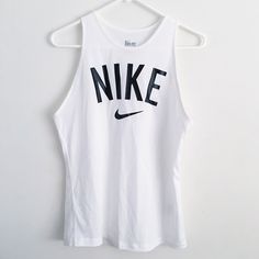 Brand New. Size Small. Loose Fit Around The Chest. Open To Offers White Racerback Top For Streetwear, White Sleeveless Top With Logo Print, Nike White Tops For Summer, Casual White Racerback Top, White Nike Racerback Top, White Casual Nike Tank Top, Casual White Nike Tank Top, White Logo Print Tank Top For Streetwear, Nike White