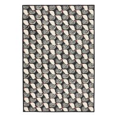 a black and white rug with an abstract design